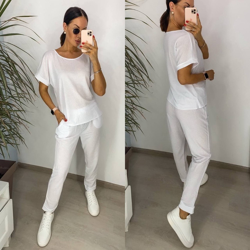 Знижки костюм жатка
Костюм женский
Описание:  практичный костюм летний на каждый день 
штаны на резинке, футболка разлетайка с разрезами по бокам
Ткань: американский креп
Артикул: GARNA-223935